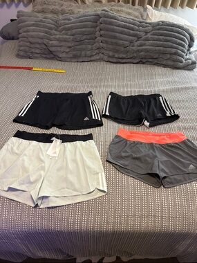 Adidas women shorts bundle of 4, 3 Large, 1 NWT XL